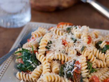 Fusilli Pasta with spinach, Asiago cheese, and cherry tomatoes - The Kitchen Snob