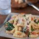 Fusilli Pasta with spinach, Asiago cheese, and cherry tomatoes - The Kitchen Snob