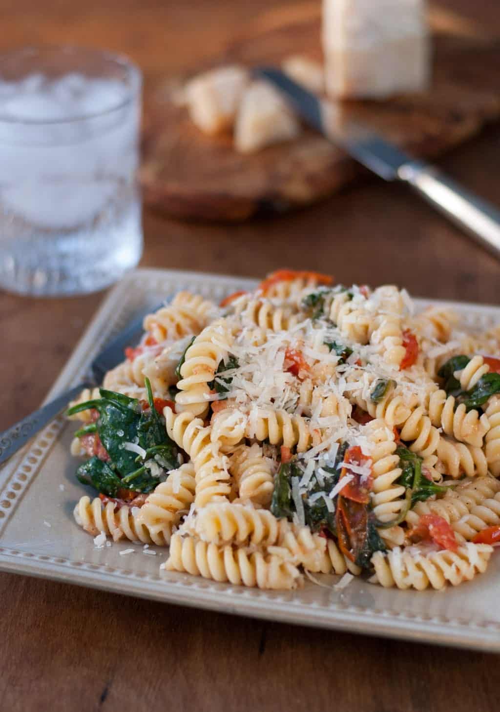 Fusilli Pasta with spinach, Asiago cheese, and cherry tomatoes - The Kitchen Snob