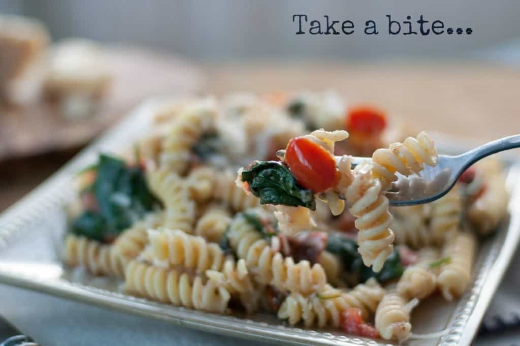 Fusilli pasta with spinach, Asiago cheese, and cherry tomatoes - www.thekitchensnob.com