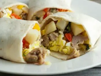 The ultimate 2 minute breakfast - Freezer Breakfast Burritos with chicken sausage, peppers, and feta - ready to eat in 2 minutes!