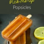 Two brown ice tea popsicles stacked on top of each other partially melted with lemon slices and text that says Southern Sweet Tea Pick-Me-Up Popsicles