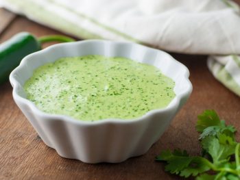 Peruvian Green Sauce aka Aji Amarillo sauce or Aji Verde sauce - this has a serious kick! Made with jalapenos, cilantro, aji pepper sauce & lime