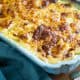 Cheesy Scalloped Potatoes Au Gratin with Gruyere and Fontina - has a hint of garlic and Parmesan cheese. The BEST casserole for a great side dish!