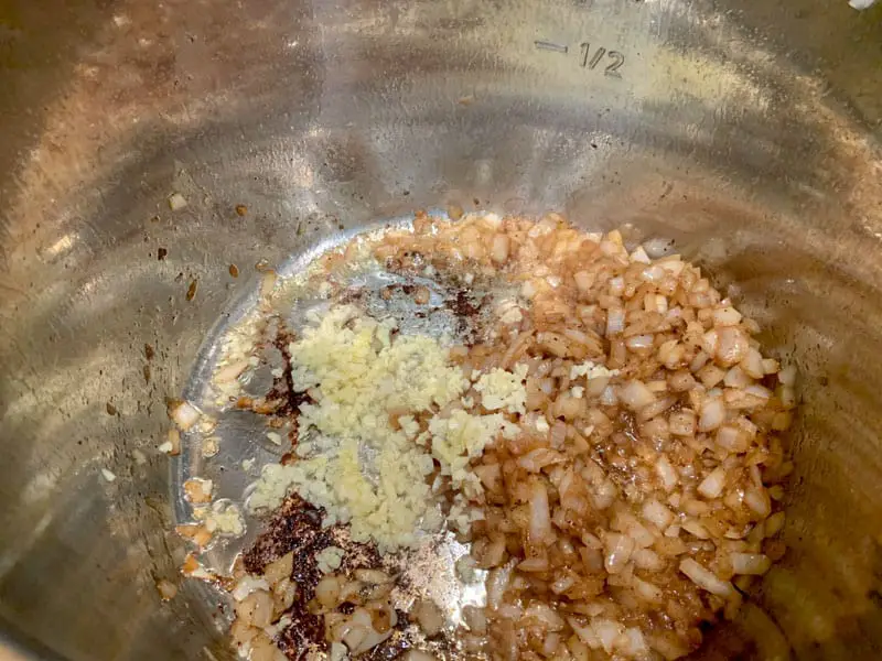 Garlic and onions cooking in an Instant Pot