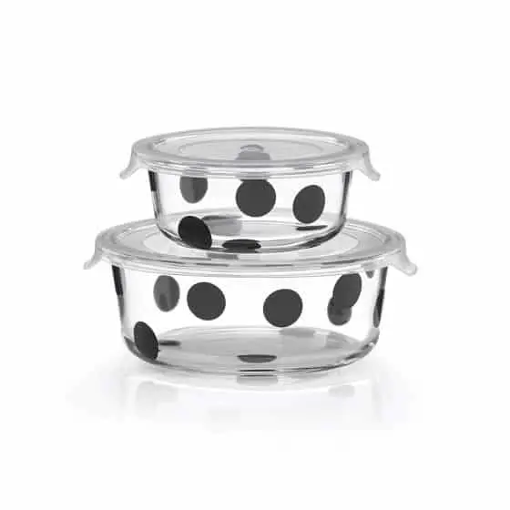 2 clear glass storage containers with black polkadots