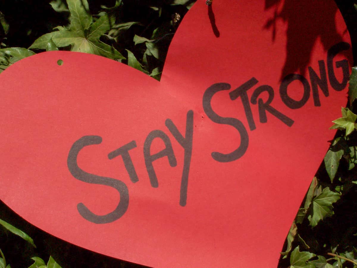 Cut out red paper hard that says Stay Strong